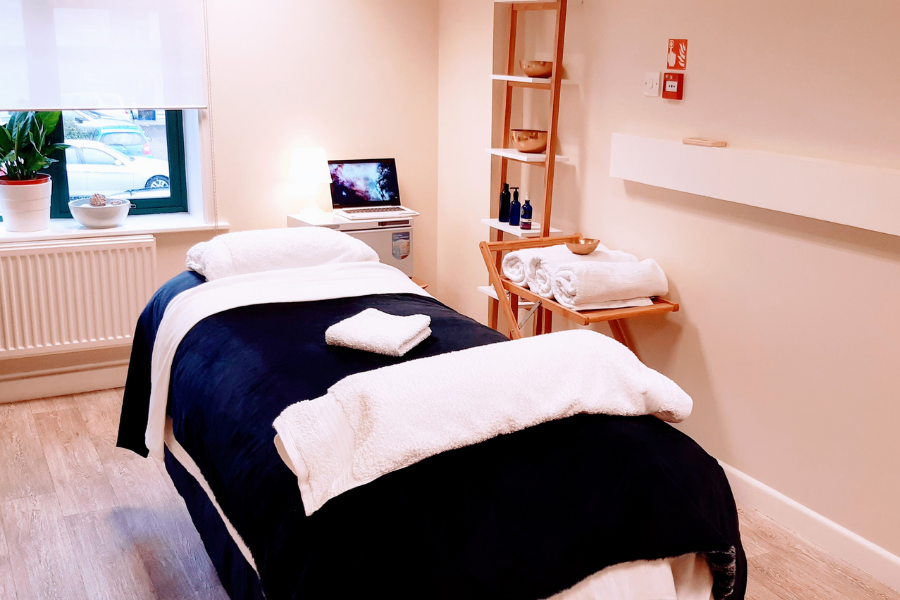 Treatment room with bed